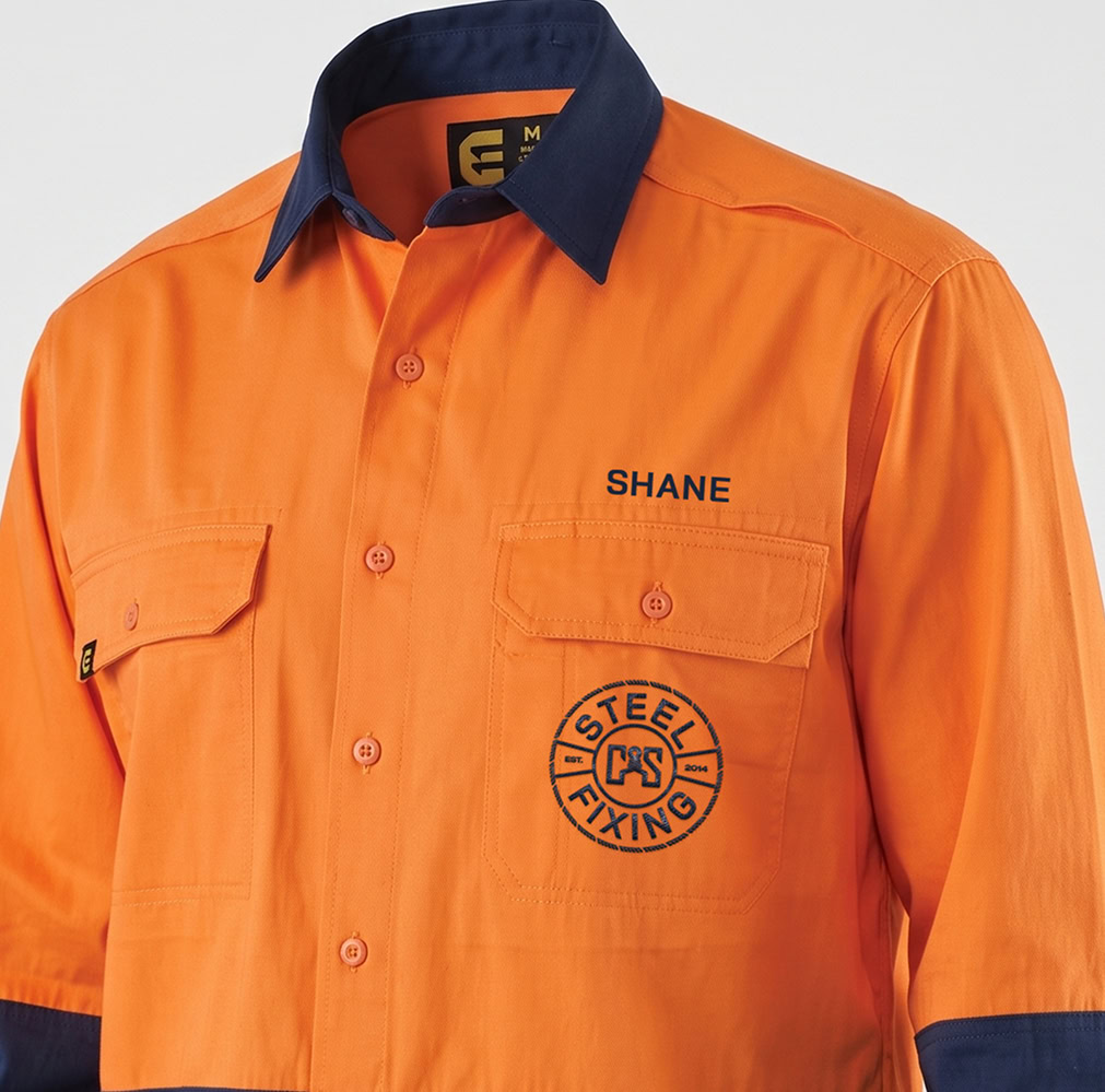 High-visibility orange work shirt with steel fixing logo and name tag.